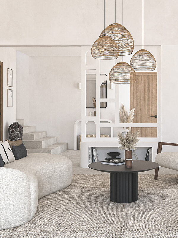Salon d’une villa à Antibes décoré dans un style méditerranéen minimaliste, avec meuble d’entrée sur mesure en siporex à double fonction, réalisé par Jennifer Fauchart, designer d’intérieur – Agence ELEGANCE